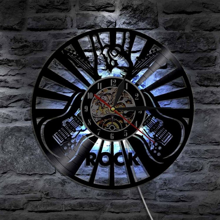 Rock Music Party Vinyl Clock displayed on a wall, perfect for enhancing home decor.