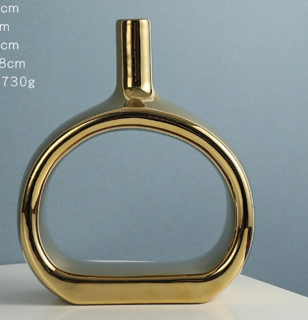 Chic Nordic Style Heart Hollow Out Electroplated Ceramic Vase, featuring a luxurious silver electroplated finish.