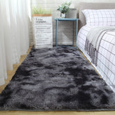 Luxurious plush carpet floor mat with a colorful tie-dyed pattern for comfort and style.