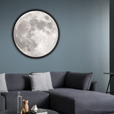 Home Moon Mirror in use with a person preparing for the day, showcasing its practicality and style.