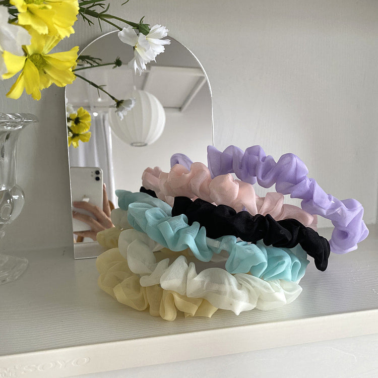 Elegant Mirror Makeup Mirror Desktop Decoration placed on a vanity, essential for daily grooming.