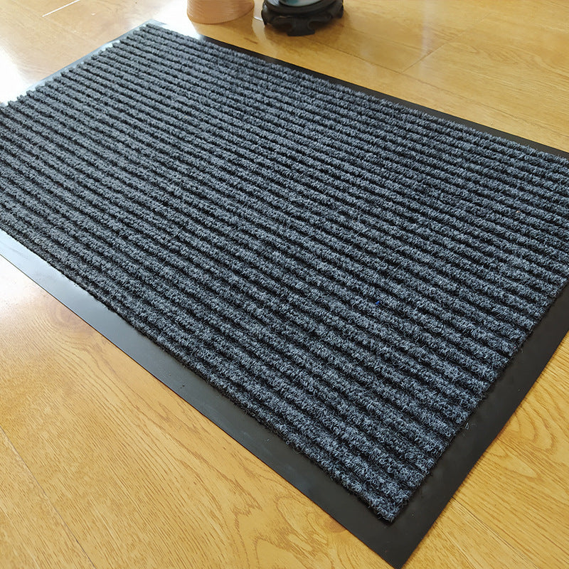 Anti-slip Mat Polypropylene Carpet Disinfection Mat in a stylish entryway with modern decor.