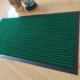 Anti-slip Mat Polypropylene Carpet Disinfection Mat placed at the entrance of a home, demonstrating its anti-slip feature.