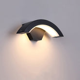 Curved Moon Induction Wall Light installed in a modern corridor, providing efficient and ambient lighting for the space.