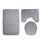 Three-piece Toilet Seat Toilet Mat Bathroom Non-slip Mat with a close-up view of the non-slip backing, ensuring secure placement on the floor.