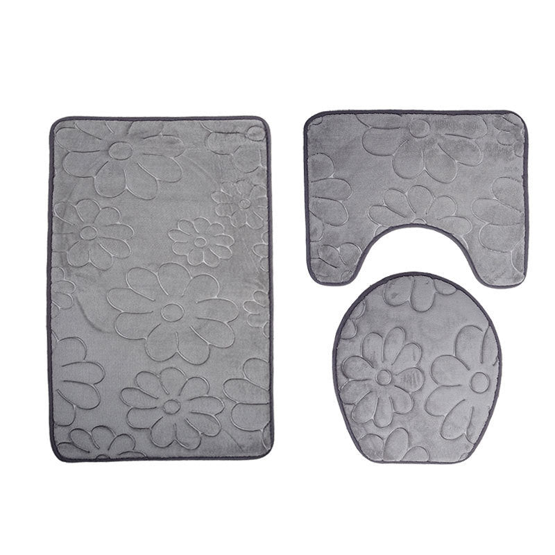 Three-piece Toilet Seat Toilet Mat Set featuring a stylish design with a non-slip backing for added safety in the bathroom.