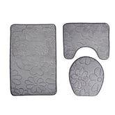 Three-piece Toilet Seat Toilet Mat Set featuring a stylish design with a non-slip backing for added safety in the bathroom.