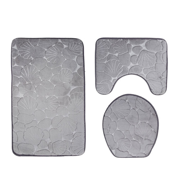 Three-piece Toilet Seat Mat Set featuring a stylish toilet mat, contour mat, and pedestal mat with a non-slip design for safety and comfort.