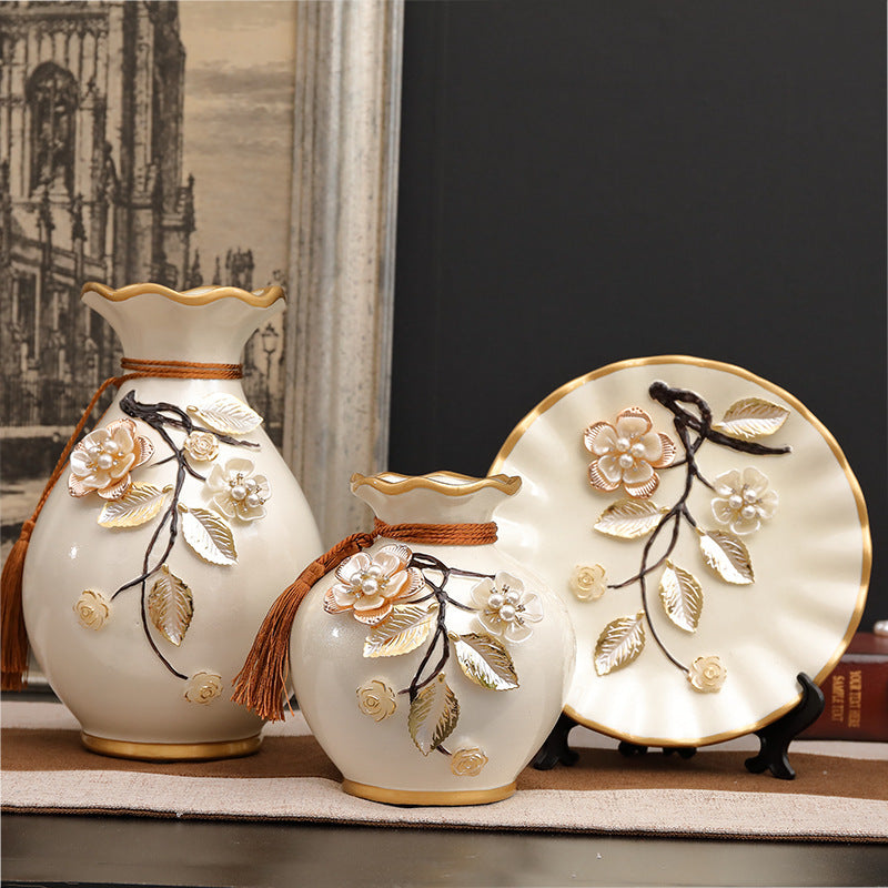 Charming Three-piece European-style Ceramic Vase set styled elegantly with flowers, bringing a touch of nature to any room.
