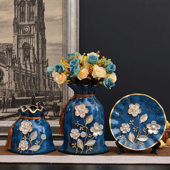 Stylish Three-piece European-style Ceramic Vase set with modern decor and fresh flowers, adding elegance to any room.