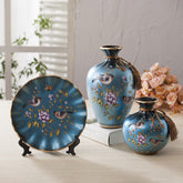 Three-piece European-style Ceramic Vase displayed elegantly with vibrant flowers, adding charm to your home decor.