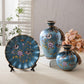 Three-piece European-style Ceramic Vase displayed elegantly with vibrant flowers, adding charm to your home decor.