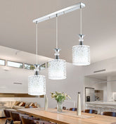 Modern Minimalist Nordic Single Head Chandelier illuminating a stylish dining room with soft lighting.