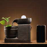 Overall view of the Decorative Circulating Ceramic Fountain Small Humidifier, perfect for adding charm and humidity to your living space.