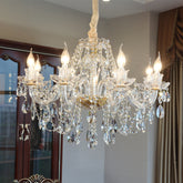 Luxury Crystal Chandelier In Living Room illuminating a cozy space with style.