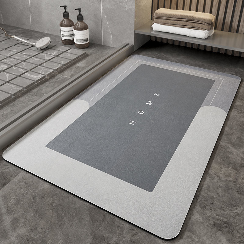 Napa Skin Super Absorbent Bath Mat on a bathroom floor, highlighting the quick drying feature and non-slip backing for safety.