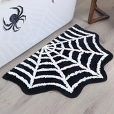 Close-up of Halloween Theme Carpet Cashmere Floor Mat Non-slip featuring bright spider web patterns.