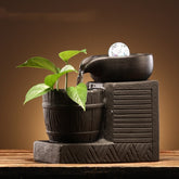 Close-up view of the Decorative Circulating Ceramic Fountain Small Humidifier water feature enhancing home decor.