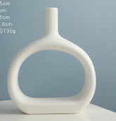 Elegant Nordic Style Heart Hollow Out Electroplated Ceramic Vase showcasing beautiful design.