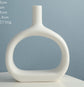 Elegant Nordic Style Heart Hollow Out Electroplated Ceramic Vase showcasing beautiful design.