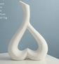 Contemporary Nordic Style Heart Hollow Out Electroplated Ceramic Vase, a great accent for fresh flowers.