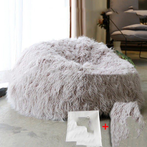 Cute Round Sofa Bedroom Chair in a stylish interior setting, perfect for cozy reading and relaxing.