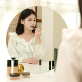 Elegant Makeup Mirror Desktop Mirror Home Net Red Desktop Round in pristine white color, reflecting a clear image for perfect makeup application.