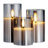 Close-up of realistic Flameless LED Candles 3 Pack, highlighting their texture and size variety for a cozy atmosphere.