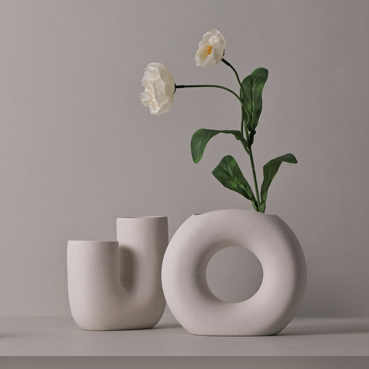 Modern Minimalist Ceramic Vase Art Decorative Ornaments showcasing sleek design and contemporary aesthetic.