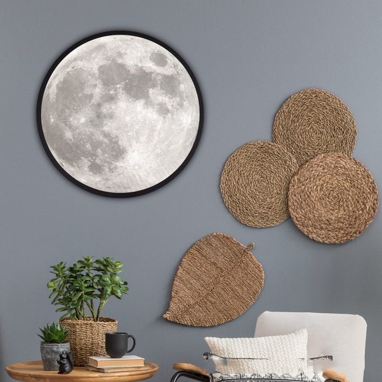 The versatile Home Moon Mirror perfectly fits into modern home decor with floral arrangement.