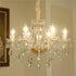 Close-up of Luxury Crystal Chandelier In Living Room highlighting intricate crystal details.
