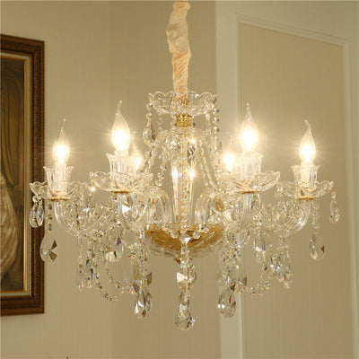 Close-up of Luxury Crystal Chandelier In Living Room highlighting intricate crystal details.