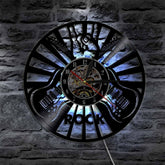 Rock Music Party Vinyl Clock displayed on a wall, perfect for enhancing home decor.