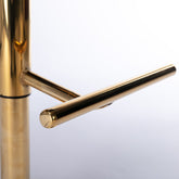 Cozy and elegant A&A Furniture Swivel Barstools showcasing the tufted whole back, ideal for enhancing your home bar or kitchen island.