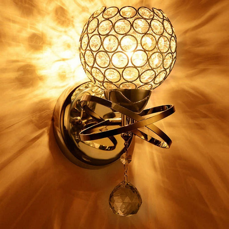 Creative Wall Lamp Bedroom Bedside Lamp showcasing elegant crystal design with warm light illumination.