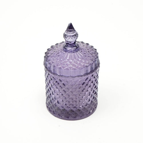 Close-up of the Plush Radiance Scented Wax Candle, highlighting the beautiful mouth-blown glass vessel and soy wax blend.