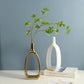 Nordic Style Heart Hollow Out Electroplated Ceramic Vase in gold finish, perfect for modern decor.