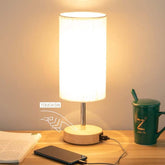 Stylish Bedside Touch Three-Gear Dimmable Table Lamp showcasing modern design and functionality in a bedroom setting.