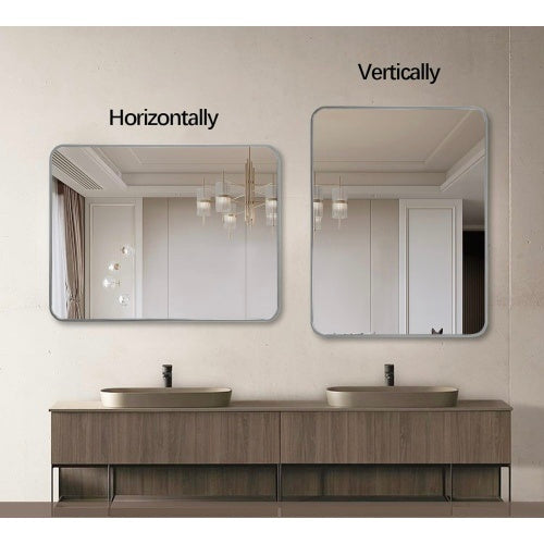 Elegant 24x36 Inch Silver Metal Framed Rectangular Bathroom Mirror showcasing durability and chic design
