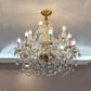 Luxury Crystal Chandelier in Living Room showcasing elegant design and sparkling details.